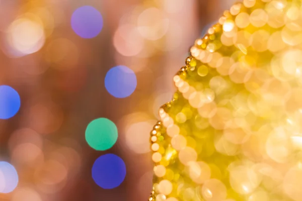 Fond de Noël. Fond abstrait festif avec des lumières et des étoiles bokeh déconcentrées. — Photo