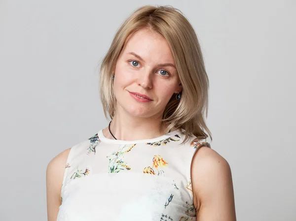 Young blonde woman smiling — Stock Photo, Image