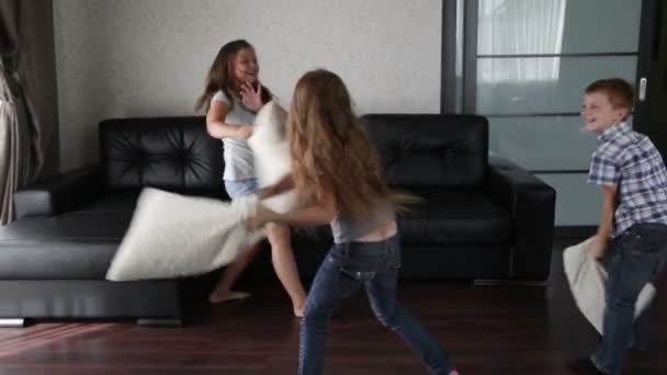 Pillow fight - three children