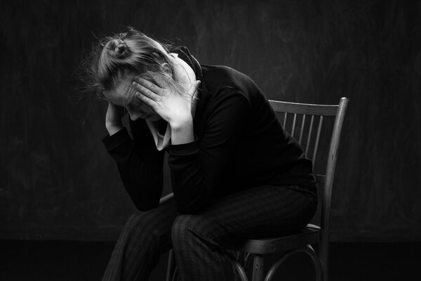 Portrait of a young sad woman