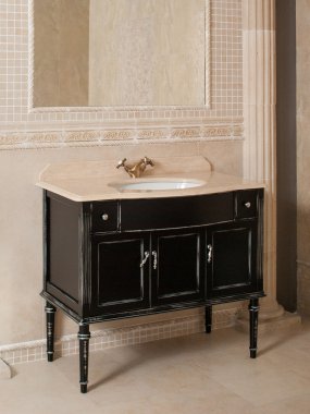 Classical  bathroom sink , decorated wall