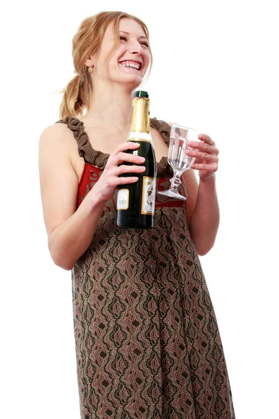 Joven mujer rubia vertiendo champán en la copa de vino — Foto de Stock