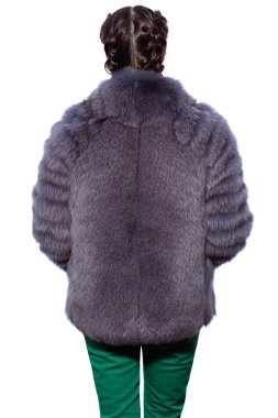 back of a woman in a violet fur coat made of arctic fox and gree