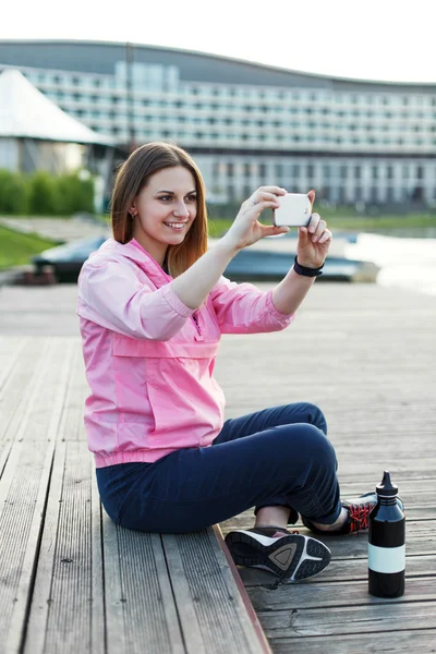 Hipster girl makes selfie photoes — Stock Photo, Image