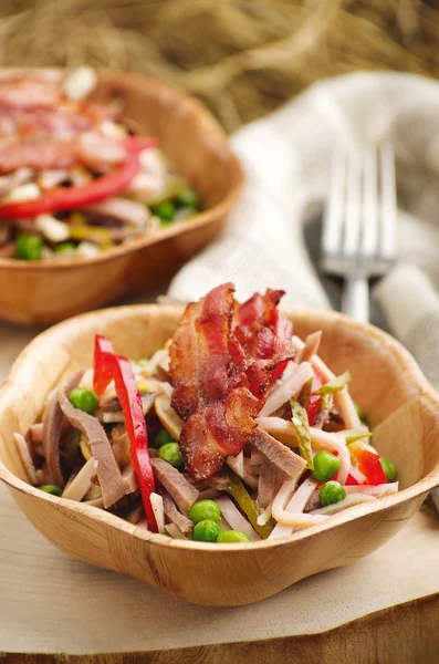 Salad with tongue and peas — Stock Photo, Image