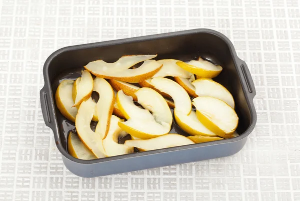 Pears in a baking dish — Stock Photo, Image