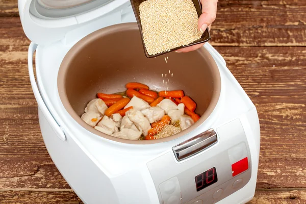 Chicken with couscous in multicooker — Stock Photo, Image