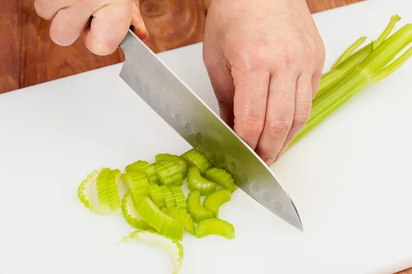 Cutting fresh celery — Stock Photo, Image