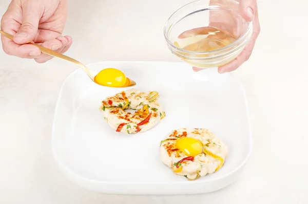 Chicken rings with egg yolk — Stock Photo, Image