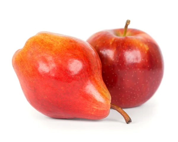 Roter Apfel und Birne — Stockfoto