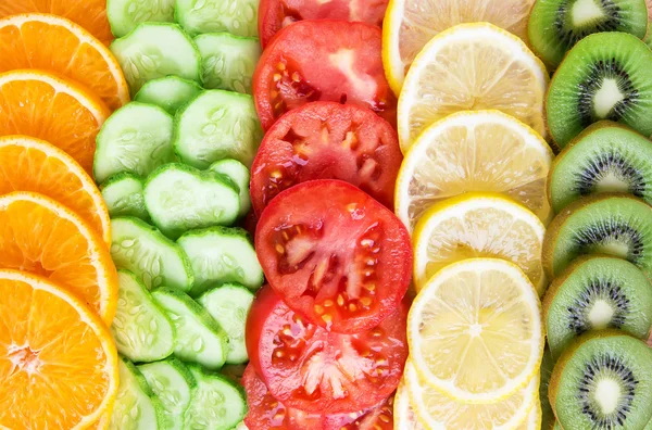 Collection of fruits and vegetables slices — Stock Photo, Image