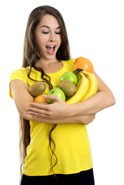 Junge glückliche Frau mit Früchten — Stockfoto