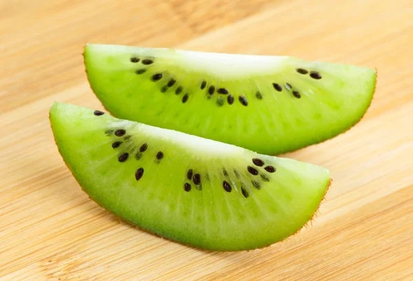 Background kiwi sliced closeup — Stock Photo, Image