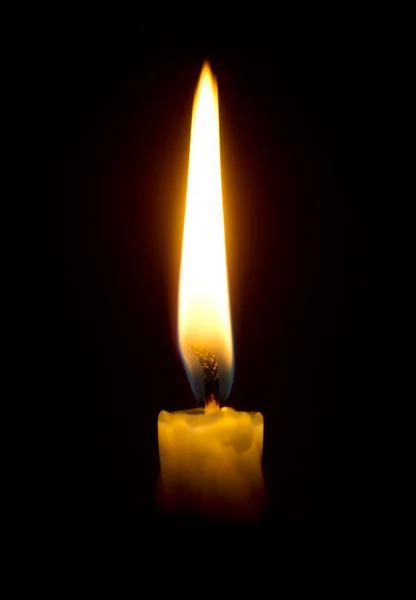 Burning candle in the dark — Stock Photo, Image
