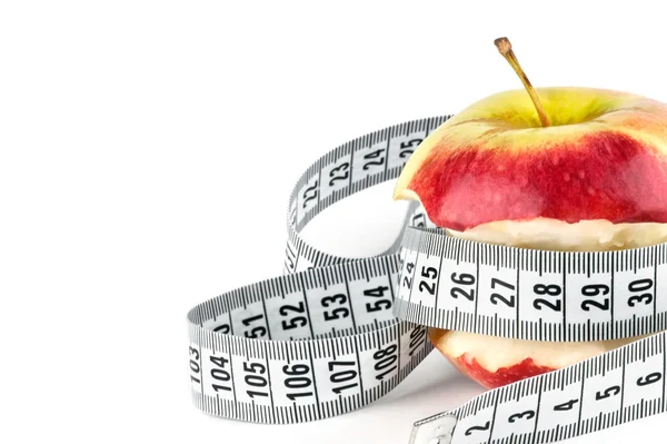 Apple core with meter — Stock Photo, Image