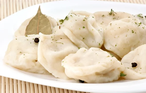 Hot dumplings on plate — Stock Photo, Image