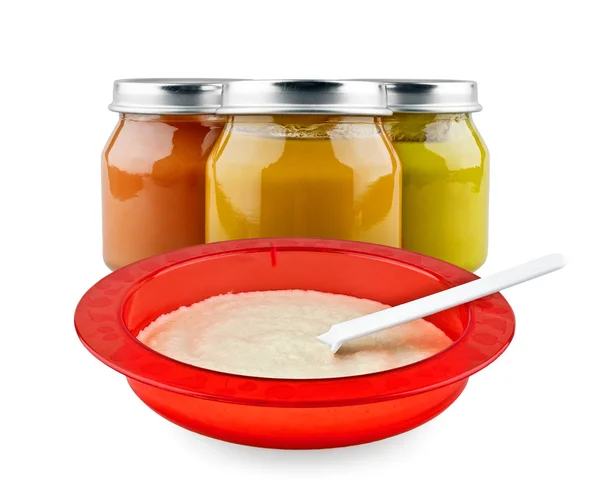 Baby puree and bowl of porridge — Stock Photo, Image