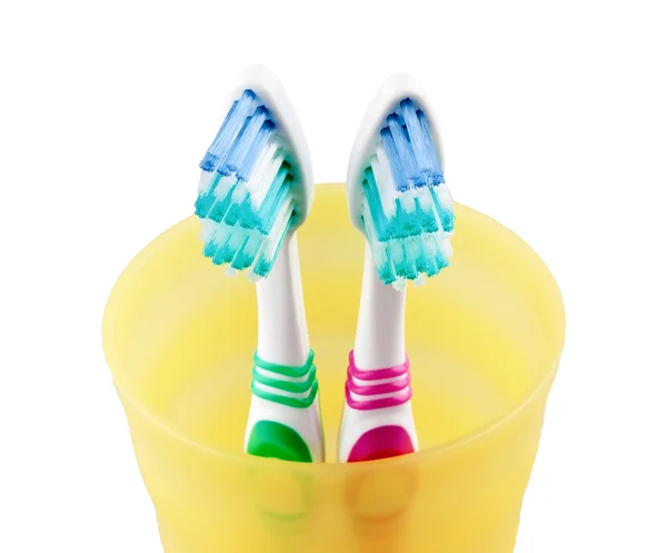 Deux brosses à dents dans un pot — Photo