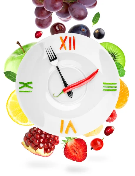 Харчовий годинник з фруктами — стокове фото