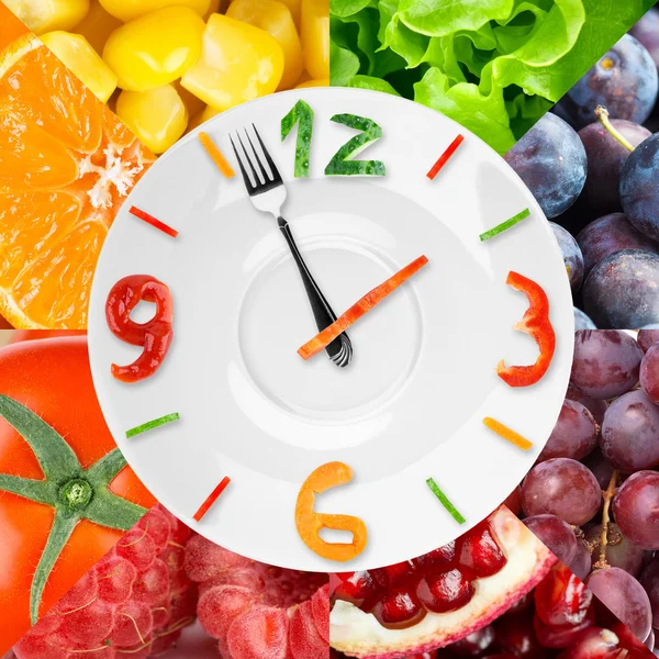 Food clock with vegetables and fruits — Stock Photo © seralex 68224821