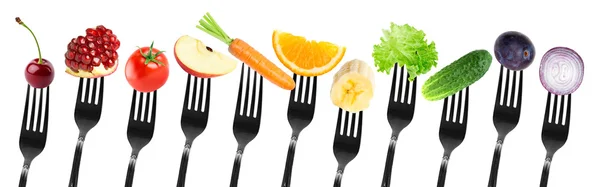 Color fruits and vegetables on fork — Stock Photo, Image