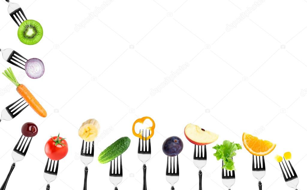 Fruits and vegetables on fork