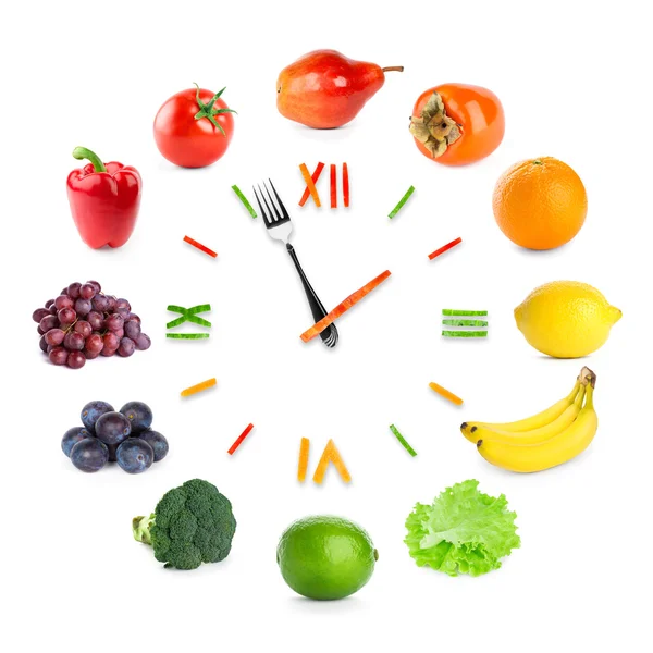 Часы с фруктами и овощами — стоковое фото