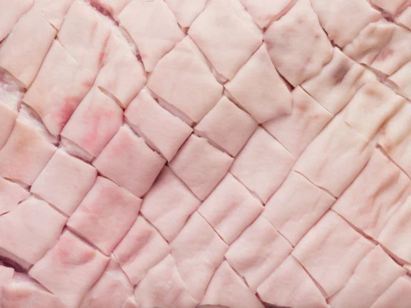 Cru não cozido pontuado carne de porco barriga pele alimento fundo — Fotografia de Stock