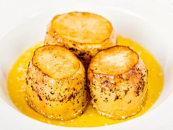 Golden fondant potato — Stock Photo, Image