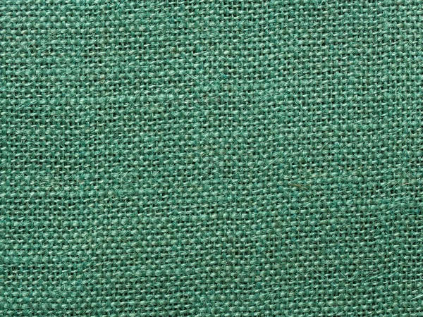 Green burlap fabric texture background — Stock Photo, Image