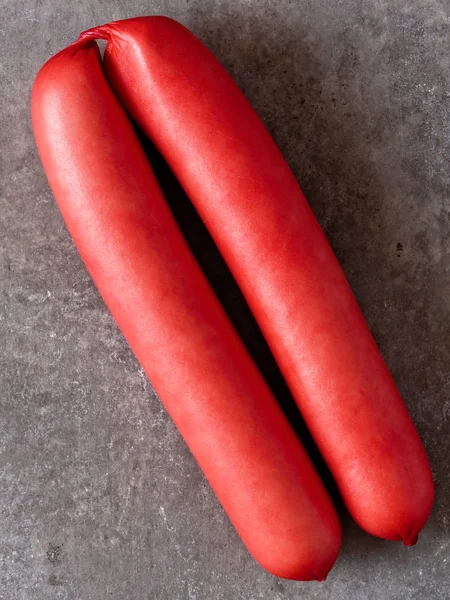 Rustic English saveloy red pork sausage — стоковое фото