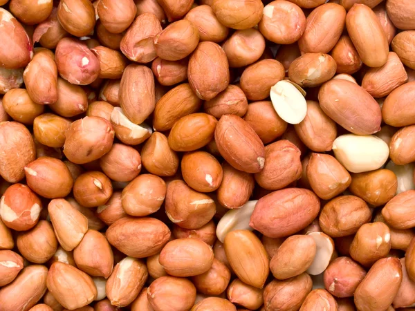 Raw uncooked peanuts — Stock Photo, Image