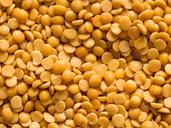 Uncooked indian dhal lentil food background — Stock Photo, Image