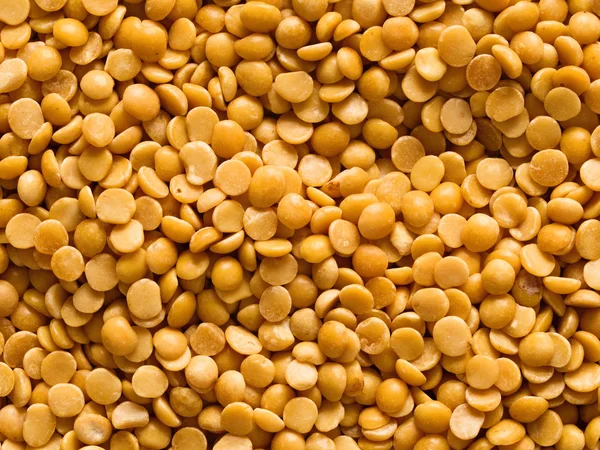 Uncooked indian dhal lentil ood background — Stock Photo, Image