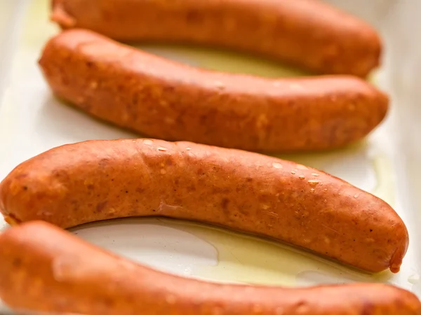 Rustic uncooked sausages — Stock Photo, Image