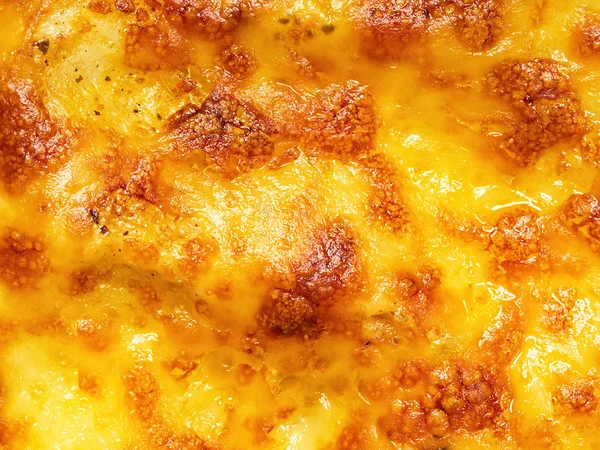 Golden lasagna baked cheese crust food background — Stock Photo, Image