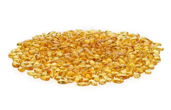 Yellow amber stones on a white background. — Stock Photo, Image