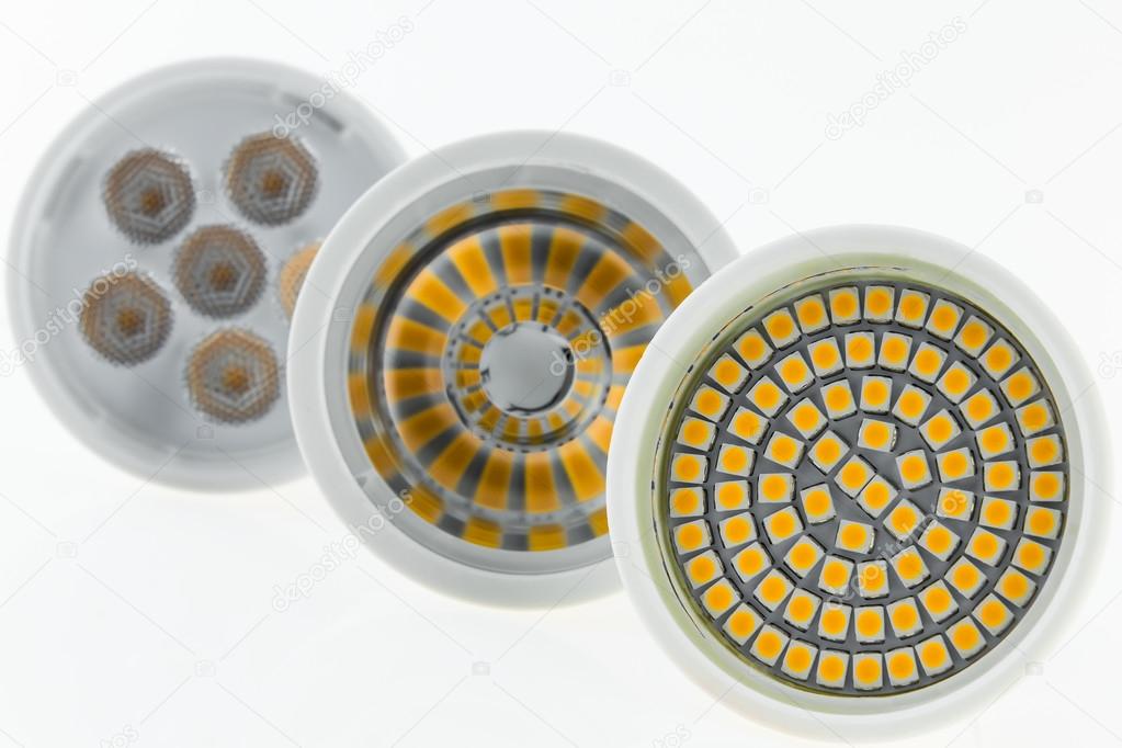 three LED bulbs with various chips and scattered light