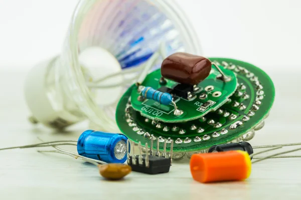 Electronic circuit board LEDs and various spare parts — Stock Photo, Image