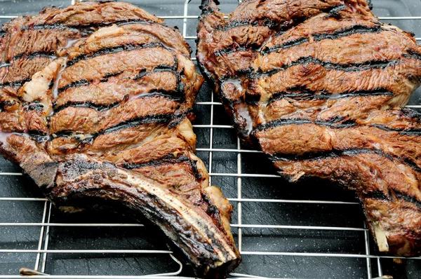 gigantic rib steak fresh from the grill