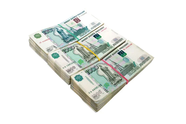 Three packs of the Russian thousand-ruble notes are isolated on a white background — Stock Photo, Image