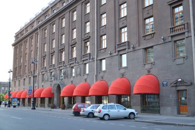 St. Petersburg. A facade of Astoria hotel with red marquises clipart