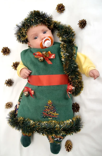 Le bébé en costume de Nouvel An d'un sapin sur un fond blanc — Photo