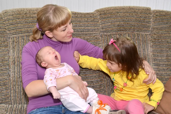 Children's jealousy. The three-year-old girl pushes away mother — Stock Photo, Image