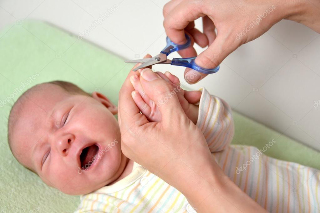 Hairstyle of nails on hands at the baby