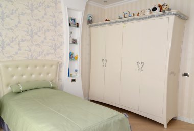 Bir çocuk yatak odasında ışık tonları bir iç parçası. 