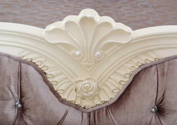 Palmette of a carved headboard of a bed — Stock Photo, Image