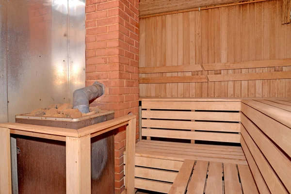 Sauna interior with the furnace — Stock Photo, Image