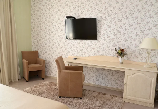 Fragment of an interior of a modern hotel room with upholstered — Stock Photo, Image