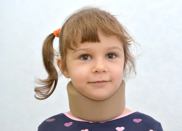 Portrait of the cheerful little girl with an orthopedic collar o — Stock Photo, Image